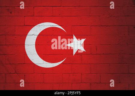 Flag of Turkey painted on a cinder block wall. Stock Photo