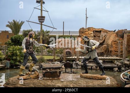 Fibre glass full size pirates in pirates cove adventure golf area in Great Yarmouth Norfolk Stock Photo