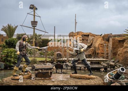 Fibre glass full size pirates in pirates cove adventure golf area in Great Yarmouth Norfolk Stock Photo