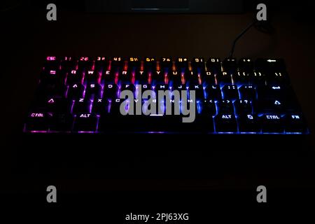 RGB backlit keyboard taken from user's POV angle Stock Photo