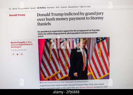 Headline on The Guardian newspaper website with breaking news of the indictment of Fm President Donald Trump, 31st March 2023.