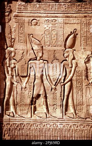 Ancient stone relief at Chnum temple of Esna in Egypt Stock Photo