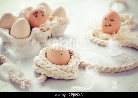 Easter eggs on wooden table. Easter decoration in vintage style Stock Photo