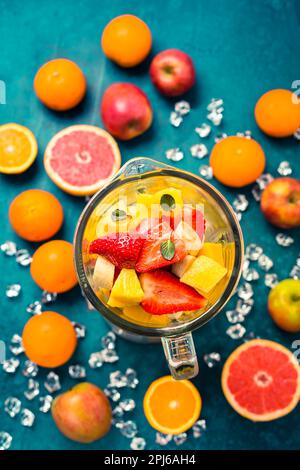Variation of fruits in mixer. Preparing milkshake or smoothie Stock ...