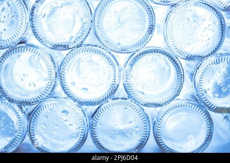Empty glass bottles ready for recycling Stock Photo
