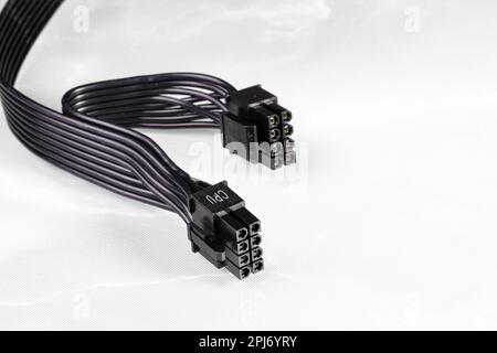 8 pins connector of the power supply wire for video card, additional power 6+2, mining, selection of the PSU power supply on reflection surface. Stock Photo
