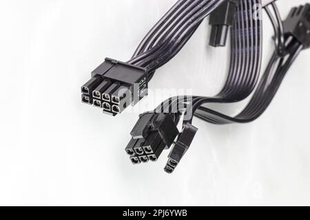 8 pins connector of the power supply wire for video card, additional power 6+2, mining, selection of the PSU power supply on reflection surface. Stock Photo
