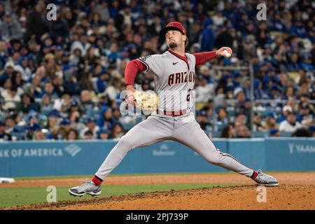 Arizona Diamondbacks relief pitcher Kyle Nelson (24) throws during a MLB game against the Los Angeles Dodgers, Wednesday, March 30, 2023, at Dodger St Stock Photo