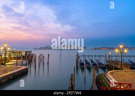 Gondolas in Venice, Italy at dawn on the Grand Canal. Stock Photo