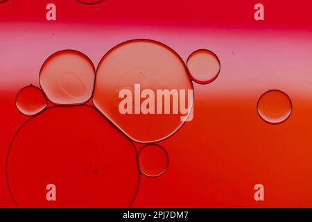 Macro close up of water bubbles with copy space over red background Stock Photo