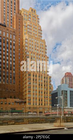 NYC Financial District: 20 and 21 West Street, adjacent brick apartment towers, were designed by Starrett & Van Vleck for different purposes. Stock Photo