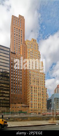 NYC Financial District: 20 and 21 West Street, adjacent brick apartment towers, were designed by Starrett & Van Vleck for different purposes. Stock Photo