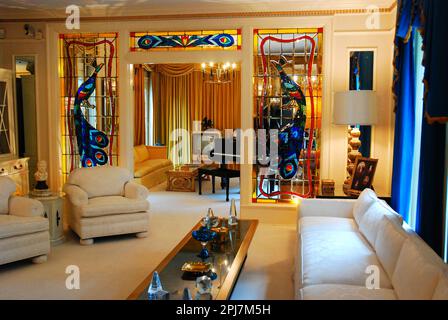 Elvis Presley's living room in Graceland shows the singer and entertainer taste in decor during the 1970s Stock Photo