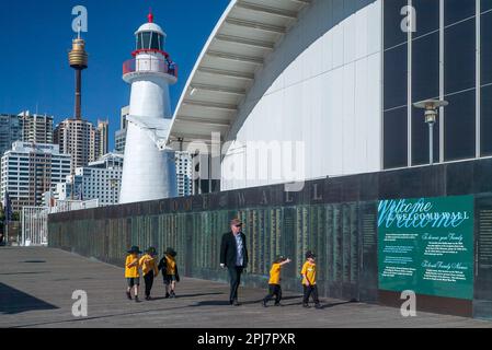 The Welcome Wall is a prominent feature of the Australian National Maritime Museum at Darling Harbour in Sydney, Australia. It pays tribute to the many migrants who have travelled the world to call Australia home. More than 200 countries are represented on the Welcome Wall, which faces Darling Harbour and Pyrmont Bay, where many migrants arrived in Australia. Stock Photo