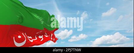 flag of Dravidian peoples Brahui people at cloudy sky background, panoramic view. flag representing extinct country,ethnic group or culture, regional Stock Photo