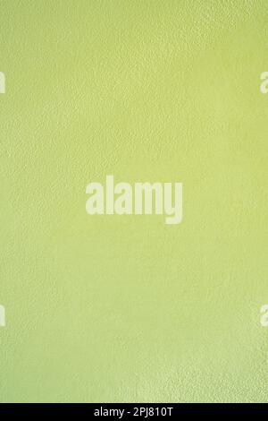Vertical of beautiful texture of green brush painted on cement wall. Stock Photo