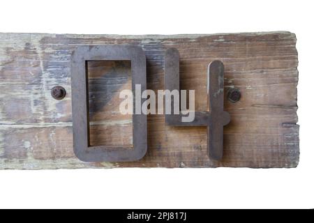 The collection of symbols old metal - number four. Isolated on wood and white background Stock Photo