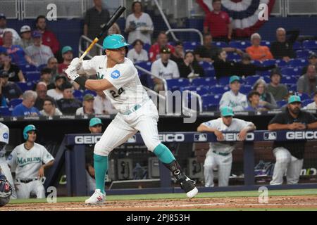 MIAMI, FL - MARCH 31: Miami Marlins third baseman Jean Segura (9) bats of  the Marlins during the game between the New York Mets and the Miami Marlins  on Friday, March 31