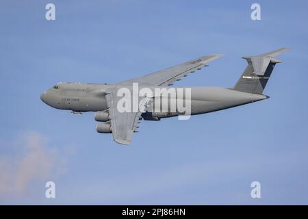 A close-up picture of a Boeing C-17 Globemaster III in the blue sky, airshow in Lakeland, April 2023 Stock Photo