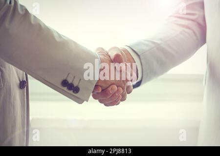 Handshakes still matter. two businessmen shaking hands. Stock Photo