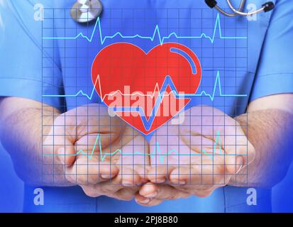 Closeup view of doctor with stethoscope and illustration of heart and cardiogram Stock Photo