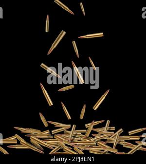 Many bullets falling on black background. Firearm ammunition Stock Photo