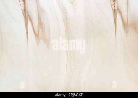 Straw-colored rough wood panel with grain texture. Generic wooden background. Stock Photo