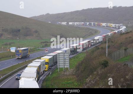 Lorries queueing on the A20 to get to the Port of Dover in Kent as the Easter getaway begins. The Port of Dover declared a critical incident as high levels of traffic caused coach passengers to experience lengthy delays. It comes as operators P&O Ferries and DFDS Seaways also reported delays to ferry and coach services, citing bad weather and hold-ups at French border controls as partly responsible for waits and queues. Picture date: Saturday April 1, 2023. Stock Photo
