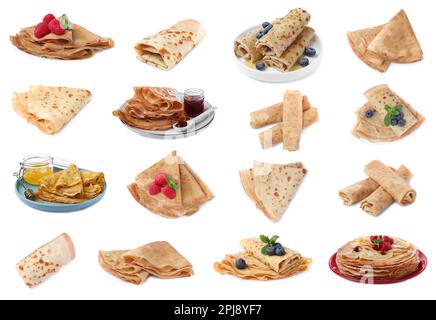 Set of delicious crepes with berries, jam and honey on white background Stock Photo