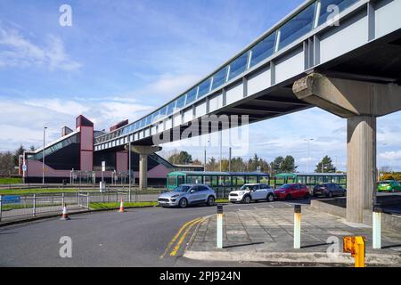 Sky walkway bridge connecting Prestwick International Airport main building to Prestwick airport Scotrail station, Ayrshire, Scotland, UK Stock Photo