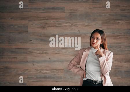 Thinking, business woman and studio idea for person contemplating plan, solution or problem solving ideas. Brainstorming entrepreneur, thoughtful and Stock Photo