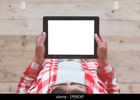 Woman using her tablet with blank of screen Stock Photo