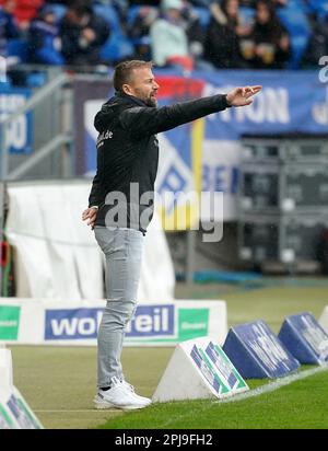 Karlsruhe, Germany. 01st Apr, 2023. Soccer: 2nd Bundesliga, Matchday 26, Karlsruher SC - Eintracht Braunschweig at BBBank Wildpark. Coach Michael Schiele from Braunschweig gives instructions to his team. Credit: Hasan Bratic/dpa - IMPORTANT NOTE: In accordance with the requirements of the DFL Deutsche Fußball Liga and the DFB Deutscher Fußball-Bund, it is prohibited to use or have used photographs taken in the stadium and/or of the match in the form of sequence pictures and/or video-like photo series./dpa/Alamy Live News Stock Photo