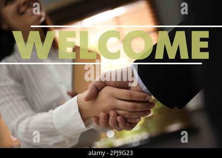 Welcome to team. Employee shaking hands with intern in office, closeup Stock Photo