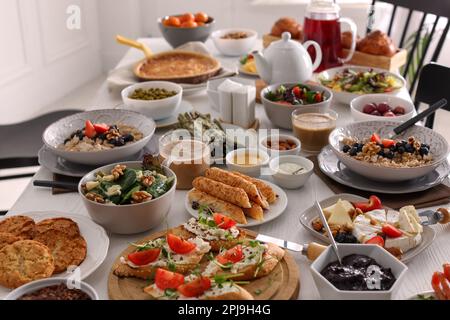 Many different dishes served on buffet table for brunch Stock Photo