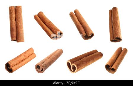 Set with aromatic cinnamon sticks on white background Stock Photo