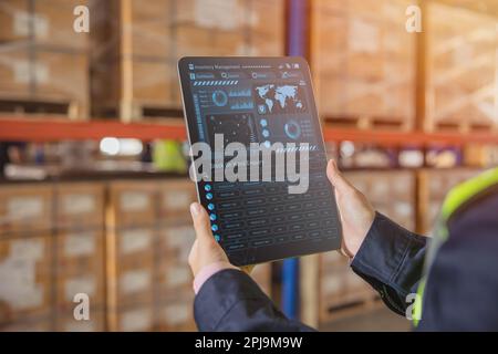 Smart warehouse management system for real time monitoring products storage shipping.  Computer logistics screen showing inventory dashboard stock con Stock Photo