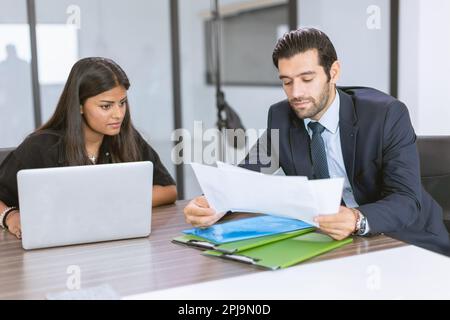 hispanic indian business people working together. india businesswoman meeting with boss. Stock Photo