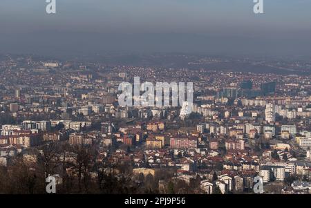 Cityscape of Banja Luka city during sunny day with haze in air Stock Photo