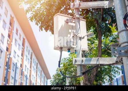 4G or 5G cellular communication in urban. Directional Grid Cell Site Base Station Telecommunication tower. Wide Area Telecommunication tower with pane Stock Photo