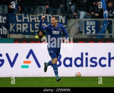 Karlsruhe, Germany. 01st Apr, 2023. Soccer: 2nd Bundesliga, Matchday 26, Karlsruher SC - Eintracht Braunschweig at BBBank Wildpark. Leon Jensen from Karlsruhe is happy about the goal for 1:1. Credit: Hasan Bratic/dpa - IMPORTANT NOTE: In accordance with the requirements of the DFL Deutsche Fußball Liga and the DFB Deutscher Fußball-Bund, it is prohibited to use or have used photographs taken in the stadium and/or of the match in the form of sequence pictures and/or video-like photo series./dpa/Alamy Live News Stock Photo