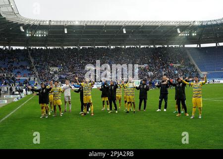 Karlsruhe, Germany. 01st Apr, 2023. Soccer: 2nd Bundesliga, Matchday 26, Karlsruher SC - Eintracht Braunschweig at BBBank Wildpark. The players from Braunschweig thank the fans who travelled with them. Credit: Hasan Bratic/dpa - IMPORTANT NOTE: In accordance with the requirements of the DFL Deutsche Fußball Liga and the DFB Deutscher Fußball-Bund, it is prohibited to use or have used photographs taken in the stadium and/or of the match in the form of sequence pictures and/or video-like photo series./dpa/Alamy Live News Stock Photo