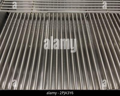 Stainless steel gas grill grates. Modern gas grill. Close-up.. Stock Photo