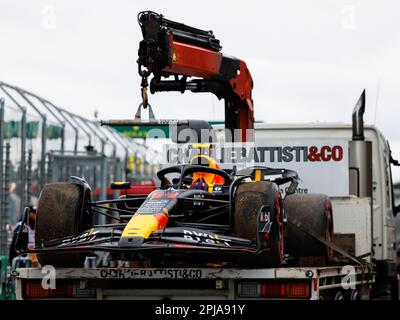 Albert Park, 1 April 2023 The car of Sergio Perez (MEX) of team Red Bull is towed back to the garaged after damage. corleve/Alamy Live News Stock Photo