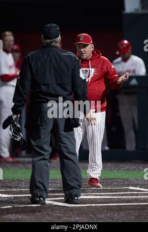Home plate umpire Perry Costello works the ACC baseball game between ...