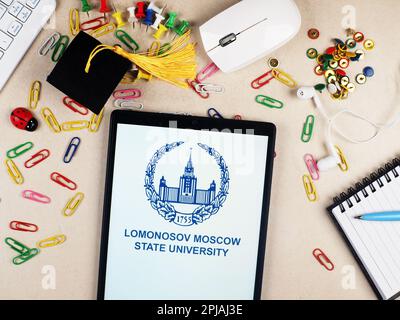 In this photo illustration,  Lomonosov Moscow State University  logo seen displayed on a tablet. Stock Photo