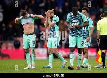 Fulham's Tom Cairney (left) and Issa Diop (right) appear dejected after the Premier League match at the Vitality Stadium, Bournemouth. Picture date: Saturday April 1, 2023. Stock Photo