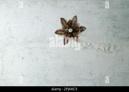 chandelier on the white ceiling in the room Stock Photo