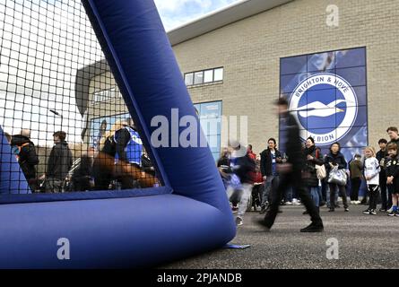 Brighton East Sussex, UK. 1st Apr, 2023. Young fans try to score a goa outside the stadium before the Brighton V Brentford Premier League match at the Amex Stadium, Brighton. Credit: MARTIN DALTON/Alamy Live News Stock Photo