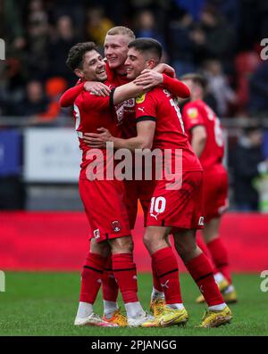 (left to right) Leyton Orient's Rob Hunt, Jordan Brown and Ruel Sotiriou celebrate after the Sky Bet League Two match at Brisbane Road, London. Picture date: Saturday April 1, 2023. Stock Photo